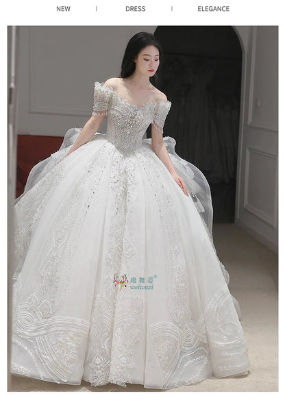 High End Quality Princess Dresses Ball Gown Crystal Heavy Beading 2025 Luxury Bridal Wedding Off Shoulder Main Wedding Dress