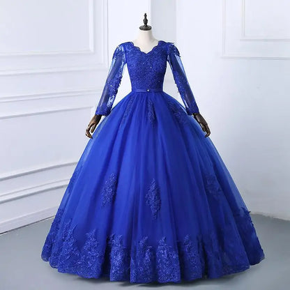 Blue evening gown on a mannequin against a white wall